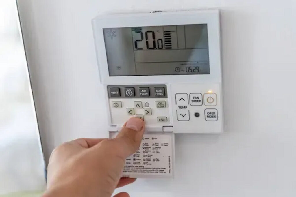 An HVAC screen showing 20 degree on it, representing the importance of knowing the 20 degree rule for HVAC.