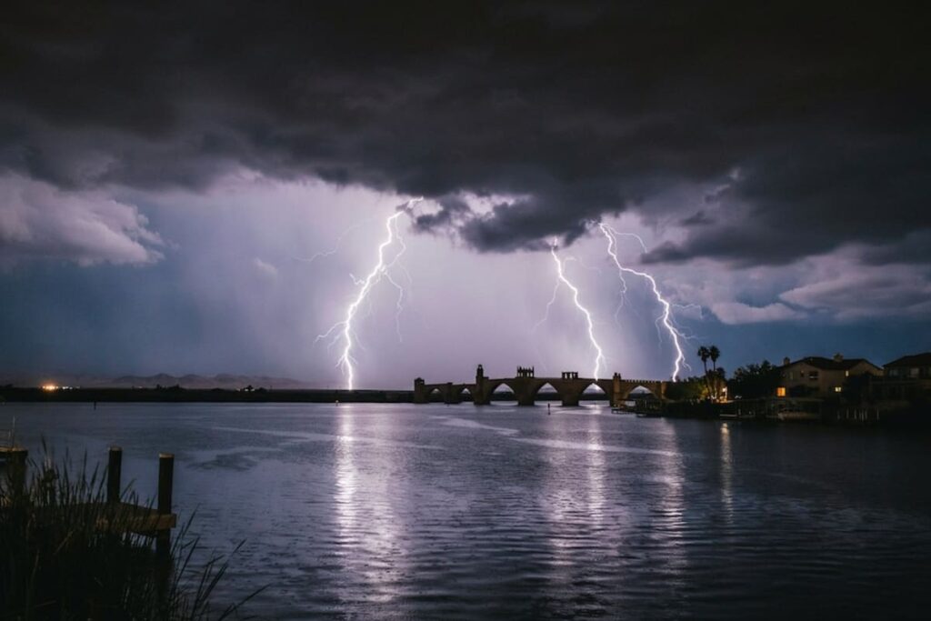 A storm in the Arizona London Bridge during monsoon season as a warning of how monsoon power outages impact your HVAC system.